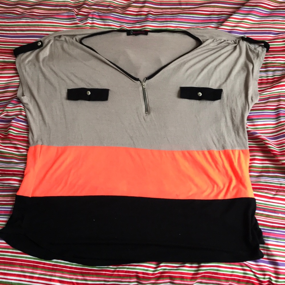 Orange black and beige t-shirt.